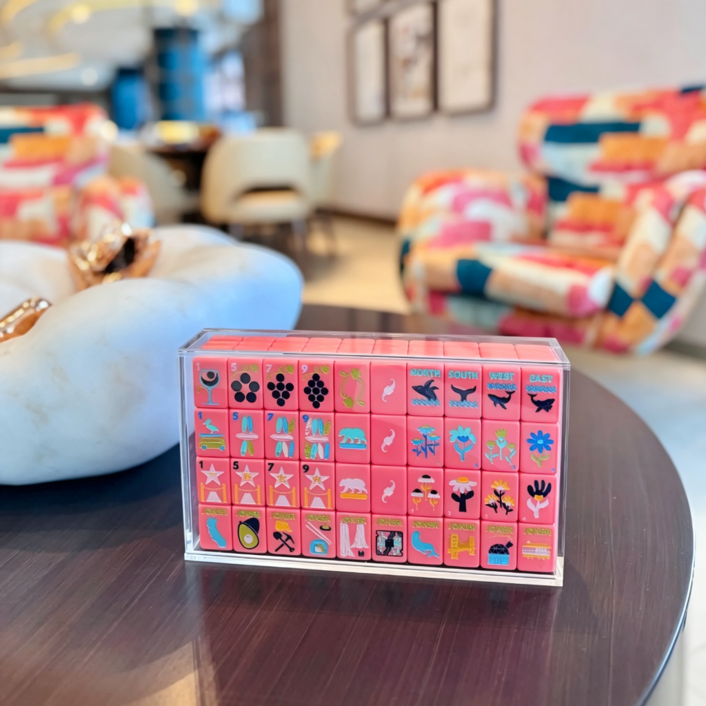 Pink themed mahjong set in a clear display case